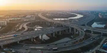 Modern highway interchange with bridges, symbolizing infrastructure progress